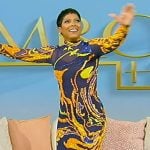 Tamron’s black sheer embellished dress on Tamron Hall Show