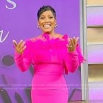 Tamron’s pink feather trim off shoulder dress on Tamron Hall Show