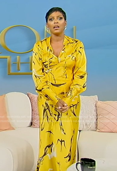 Tamron’s yellow bird print dress on Tamron Hall Show