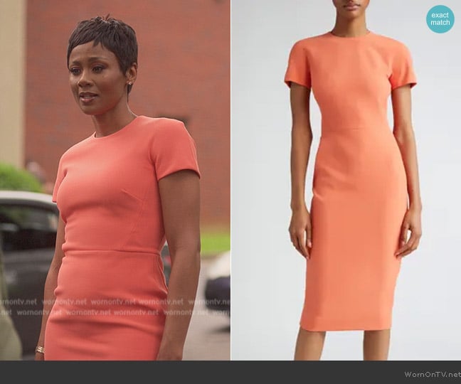 Jax’s orange sheath dress on Reasonable Doubt