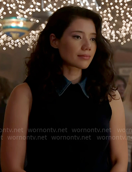 Violet’s navy sweater vest with denim collar on Chicago Fire