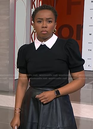 Zinhle’s black puff sleeve sweater with collar on NBC News Daily