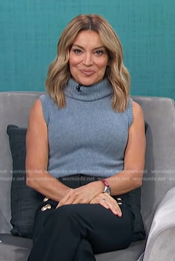 Kit's blue sweater vest on Access Hollywood