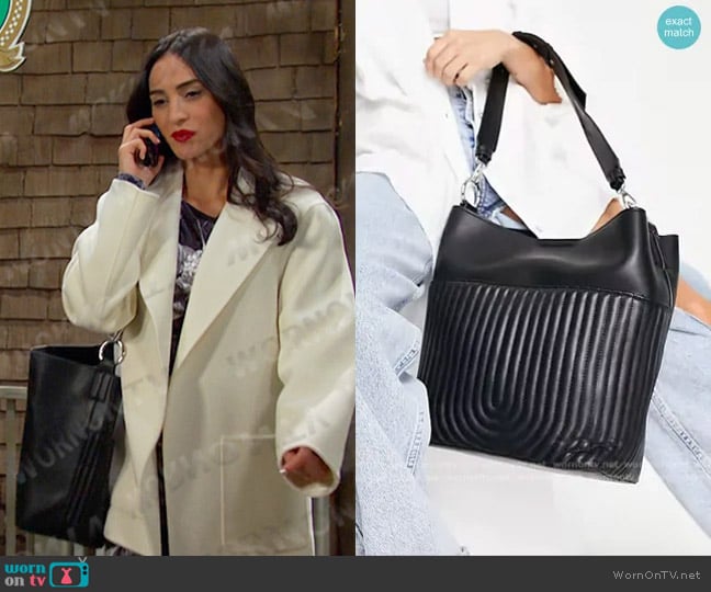 Topshop Hattie Quilt Pocket Slouch Shoulder Bag in black worn by Gabi Hernandez (Cherie Jimenez) on Days of our Lives