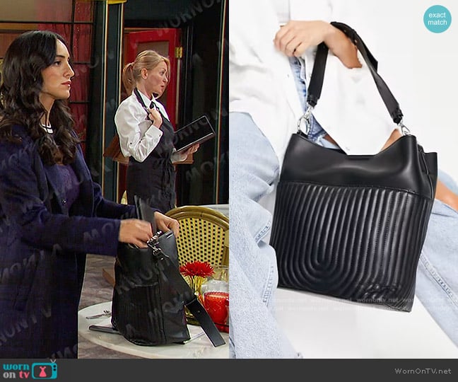 Topshop Hattie Quilt Pocket Slouch Shoulder Bag in black worn by Gabi Hernandez (Cherie Jimenez) on Days of our Lives