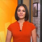 Ali Bauman’s red split-neck dress on CBS Mornings