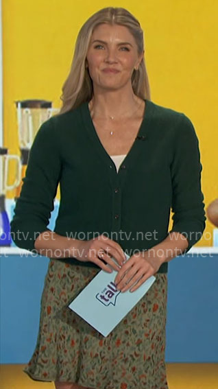 Amanda’s bottle green cardigan and floral mini skirt on The Talk