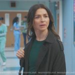 Amlia’s black trench coat and crossbody bag on Greys Anatomy