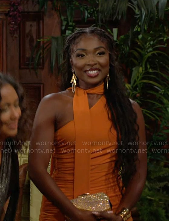 Ana’s orange one-shoulder dress at Ashley & Devon’s wedding on The Young and the Restless