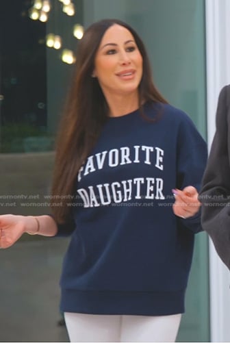 Angie’s navy Favorite Daughter sweatshirt on The Real Housewives of Salt Lake City