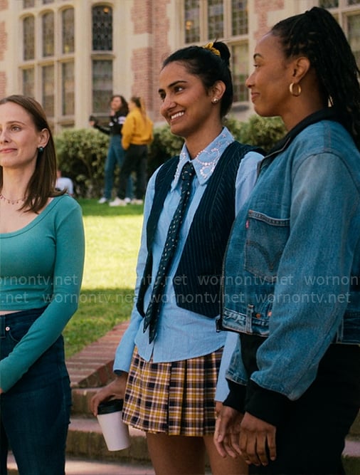 Bela’s blue striped shrit with embellished collar and pinstripe denim vest on The Sex Lives of College Girls