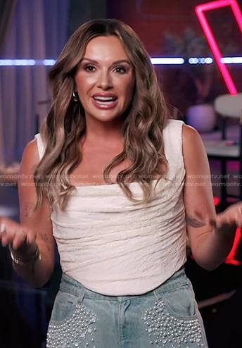 Carly Pearce’s white lace top and pearl embellished jeans on The Voice