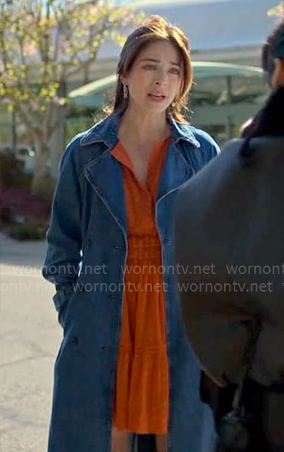 Cassandra’s orange dotted dress on Murder in a Small Town