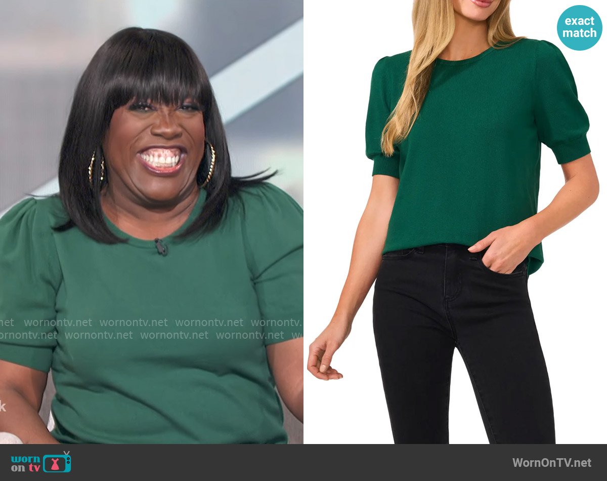 Sheryl’s green puff-sleeve sweater on The Talk