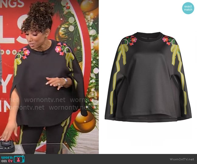 Cynthia Rowley Floral Bonded Capelet worn by Gabrielle Kerr on CBS Mornings