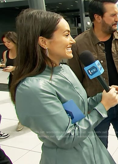 Emily Kurl’s blue leather mini dress on E! News