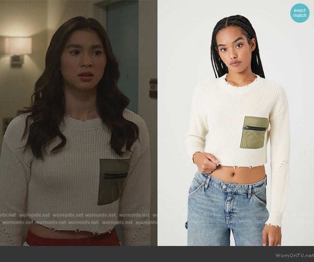 Devon’s white contrast pocket cropped sweater on Cobra Kai