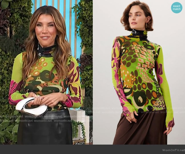 Fuzzi Abstract Mesh Top worn by Adrianna Costa on Access Hollywood