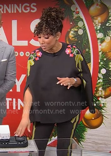 Gabrielle Kerr's black floral cape top and pants set on CBS Mornings