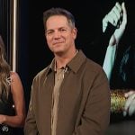 Jason’s brown jacket on E! News