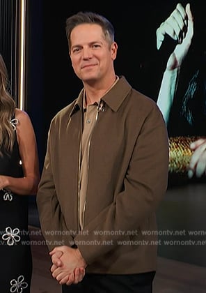 Jason’s brown jacket on E! News