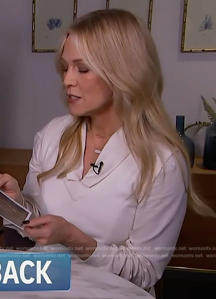 Jennie’s white vest and blouse on Access Hollywood