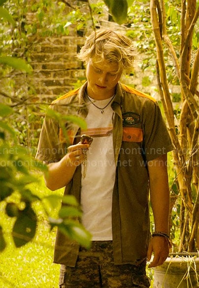 JJ’s stripe graphic tee and orange panel shirt on Outer Banks