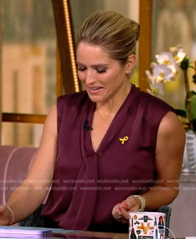 Sara’s burgundy tie neck top on The View