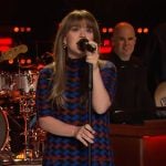 Kelly’s geometric print mock neck mini dress on The Kelly Clarkson Show