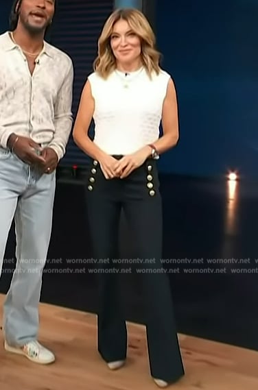 Kit’s white textured top and pants on Access Hollywood