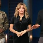 Kit’s black velvet jumpsuit on Access Hollywood