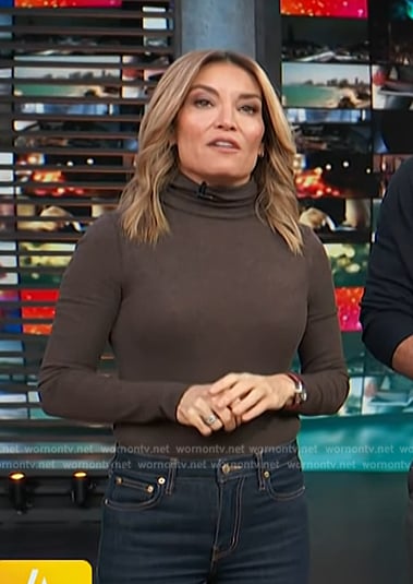 Kit's brown knit turtleneck top on Access Hollywood