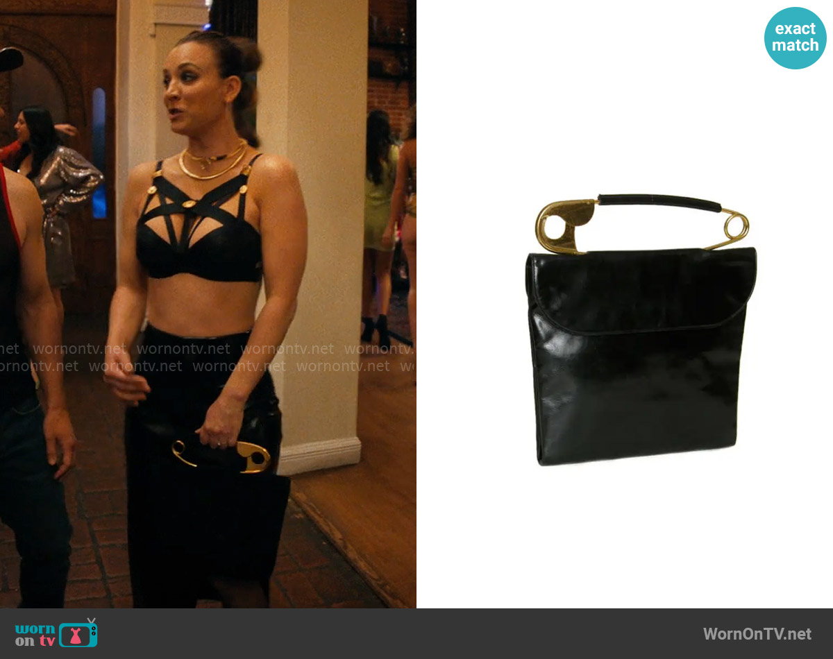 Koret Leather Handbag with Safety Pin Handle worn by Ava Bartlett (Kaley Cuoco) on Based on a True Story