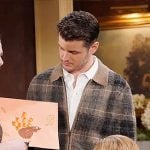 Kyle’s brown plaid zip up Thanksgiving cardigan on The Young and the Restless