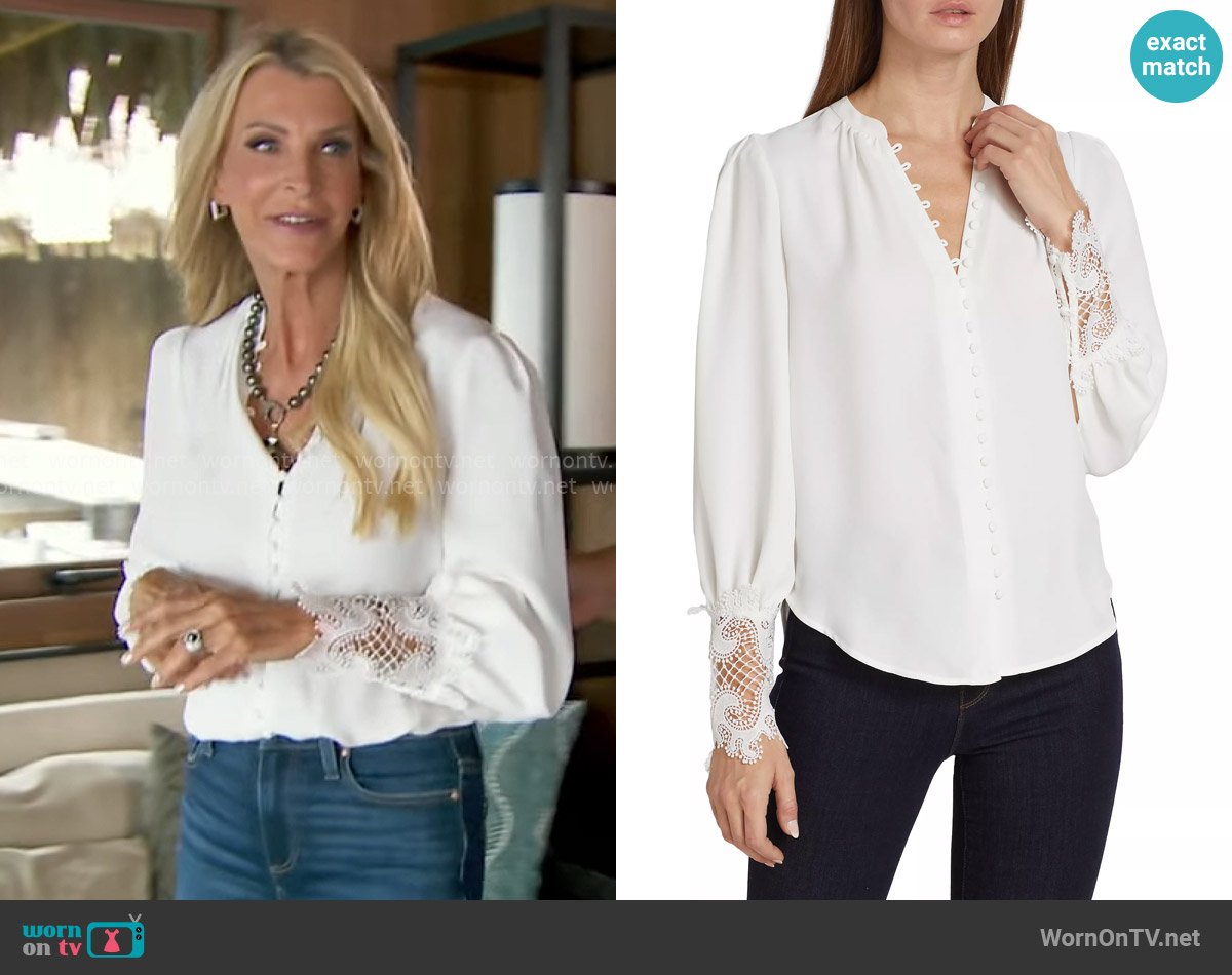 Joan’s white lace-cuff blouse on The Golden Bachelorette