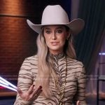 Lainey Wilson’s beige animal print top and flare pants on The Voice