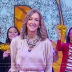 Lara’s beige blouse on Good Morning America