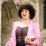 Lila’s black lace corset top and pink blazer on The Sex Lives of College Girls