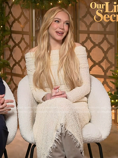 Lindsay Lohan’s white tweed fringe dress on E! News