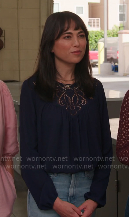 Lisa's navy blue eyelet top on Celebrations with Lacey Chabert