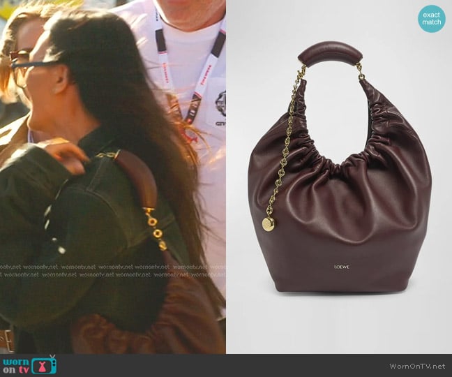 Loewe Squeeze Medium Shoulder Bag in Dark Burgundy worn by Lisa Barlow on The Real Housewives of Salt Lake City