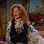 Maggie’s white floral ruffled blouse on Days of our Lives