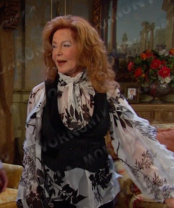 Maggie’s white floral ruffled blouse on Days of our Lives