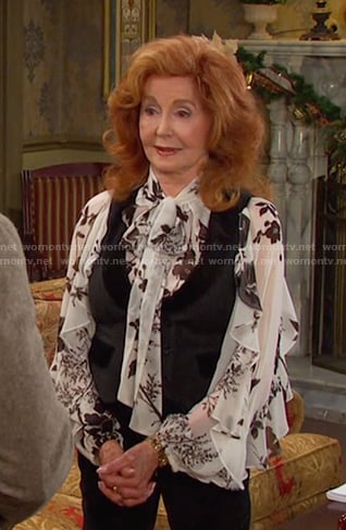 Maggie's white floral ruffled blouse on Days of our Lives