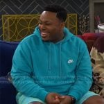 Marty’s turquoise blue Nike hoodie on The Neighborhood