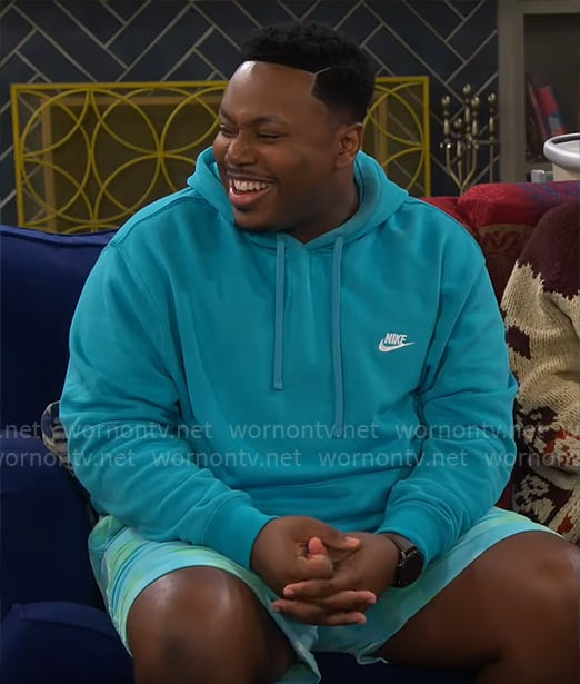 Marty’s turquoise blue Nike hoodie on The Neighborhood