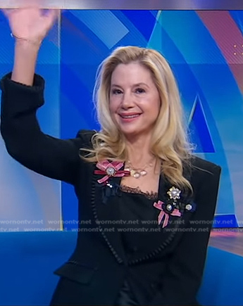 Mira Sorvino’s black ribbon embellished blazer on Good Morning America