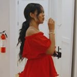 Monique’s red off shoulder ruffle dress on The Real Housewives of Potomac