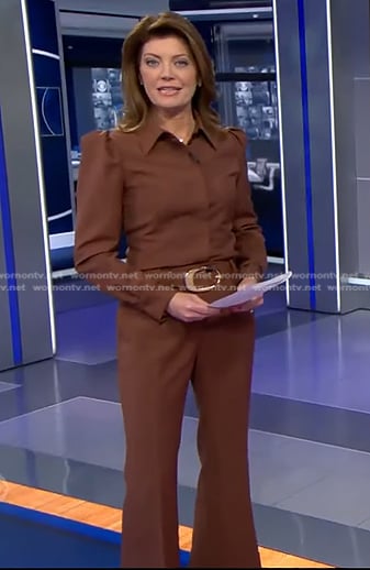 Norah's brown shirt and flare pants on CBS Evening News