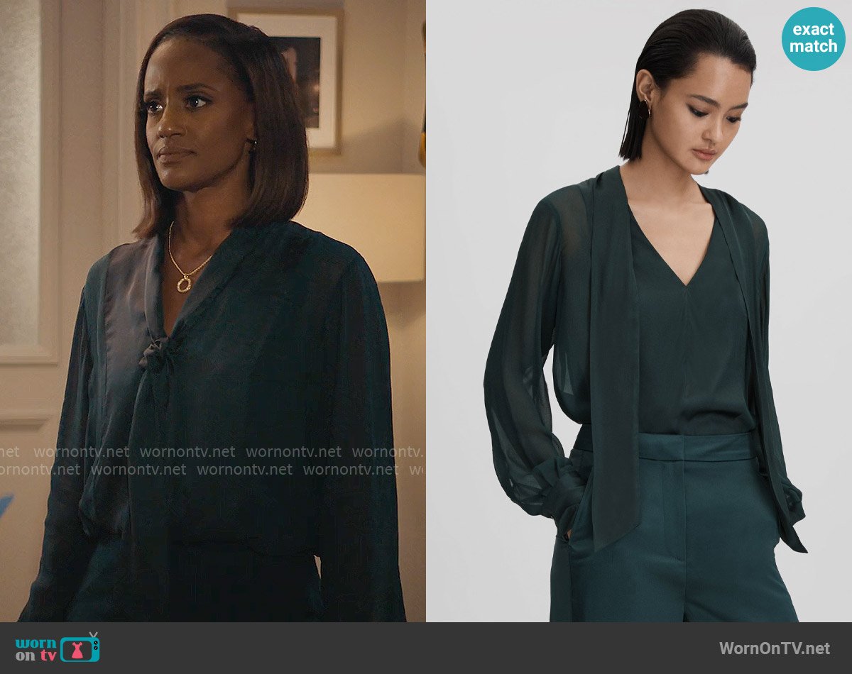 Olympia’s teal tie-neck blouse on Matlock